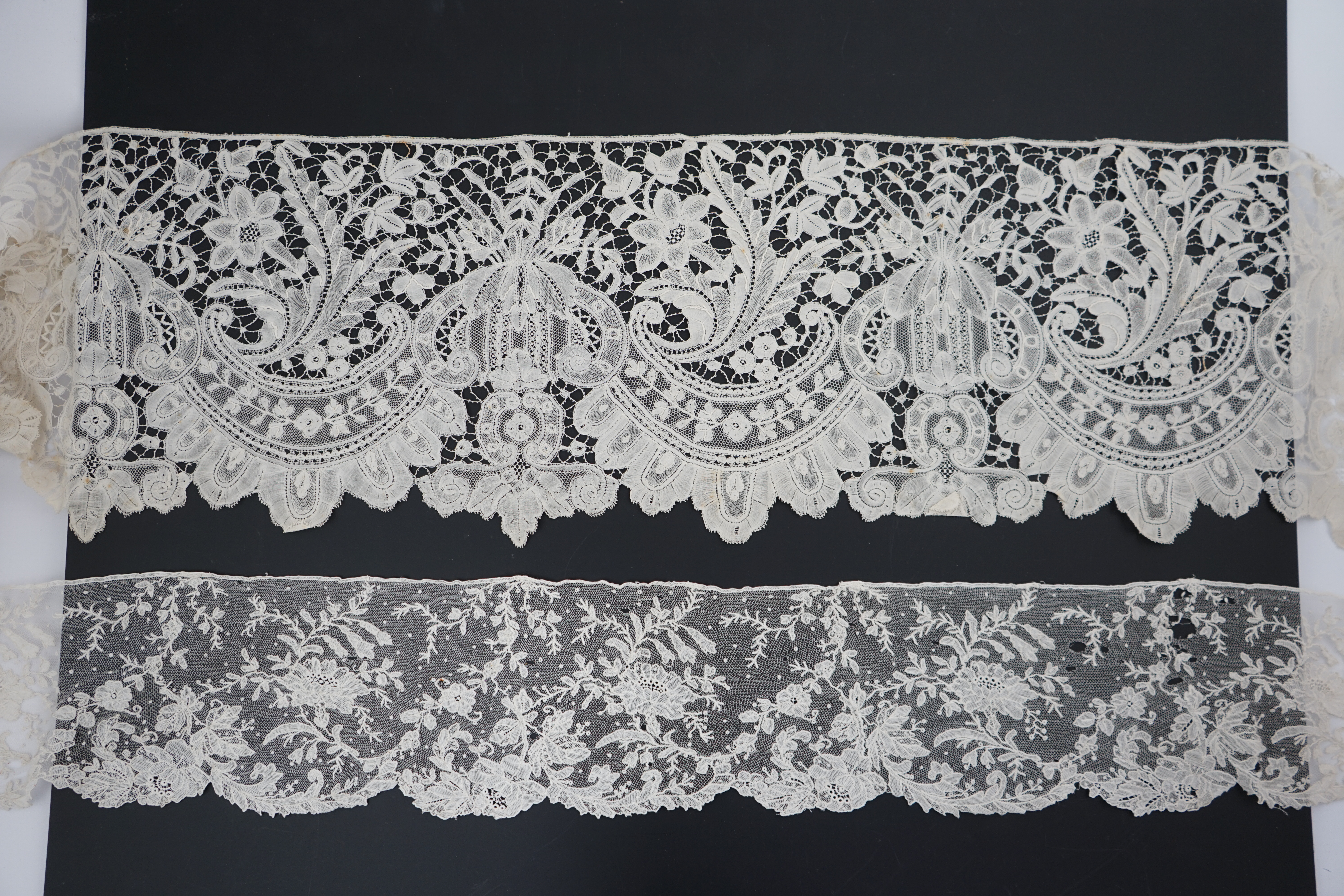 A wide length of Brussels bobbin lace trimming and a smaller narrower length of Brussels Point de gaze needle lace, Brussels bobbin lace edging 324cm long x 23cm deep, Brussels Point de gaze 102cm long x 13cm deep. Condi